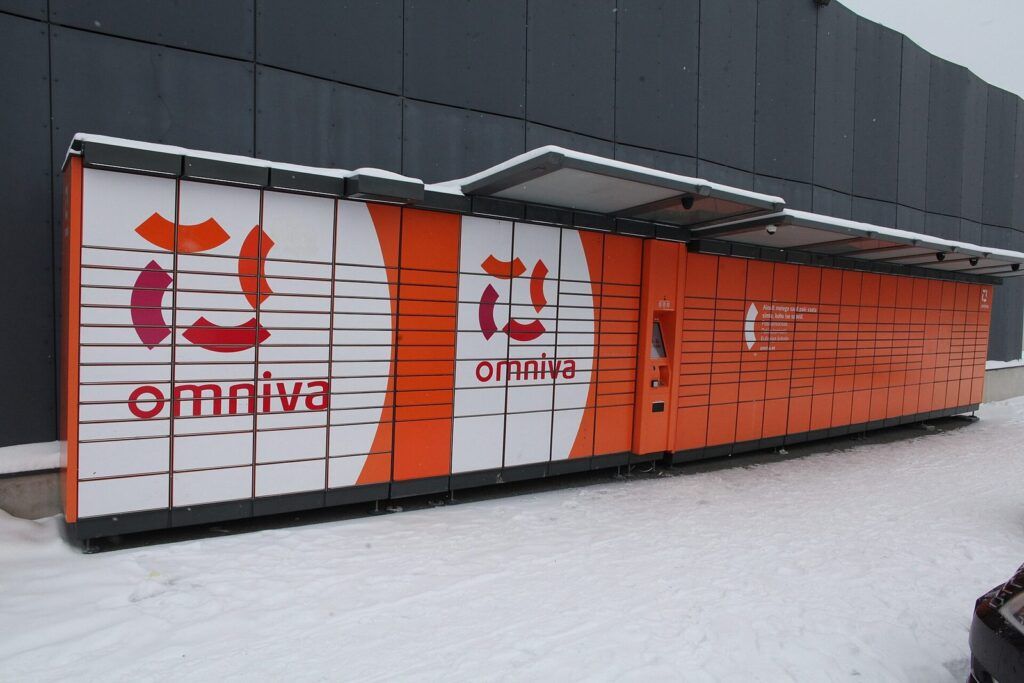 Omniva parcel locker in snow in Kose, Estonia