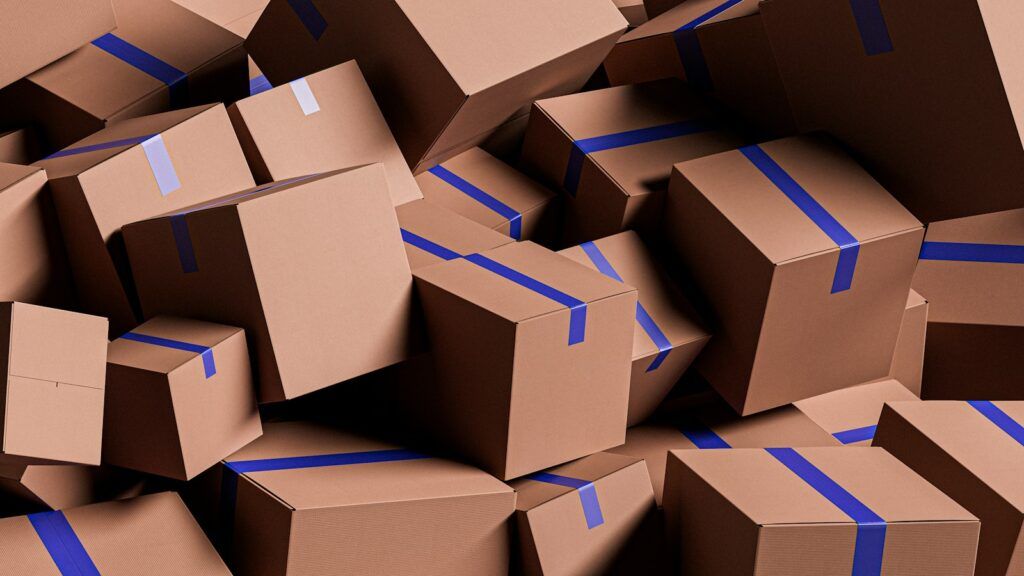 Large pile of cardboard parcels sealed with blue tape